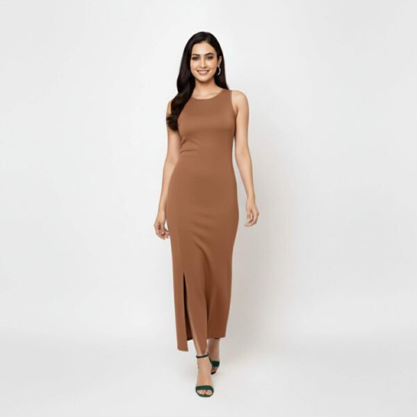Woman wearing a sleeveless brown Bodycon dress with side slit, styled with green heels, standing against a white background.