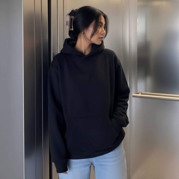 Black oversized comfort hoodie with kangaroo pocket and relaxed fit, perfect casual wear