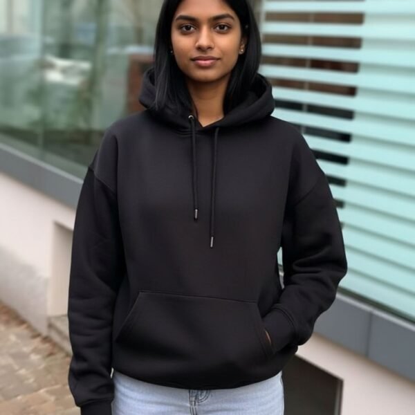 Black oversized hoodie with cozy fit, kangaroo pocket, and casual style