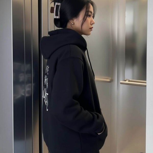 Black oversized comfort hoodie with kangaroo pocket and relaxed fit, perfect casual wear