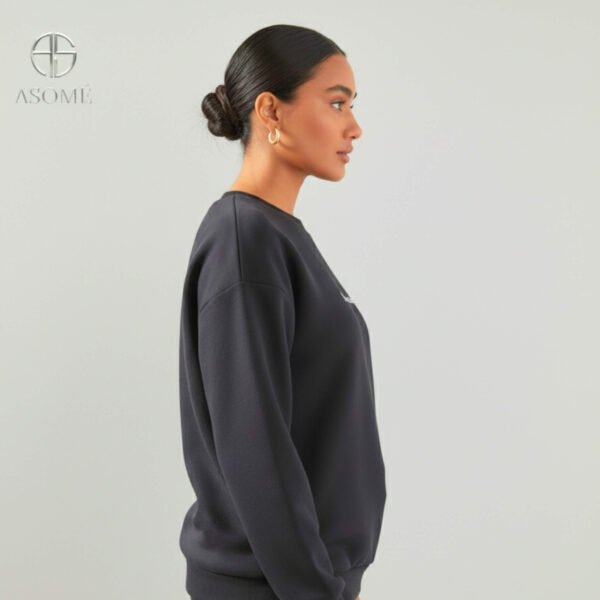 Front view of Asome black plain long hoodie with full sleeves and relaxed fit.