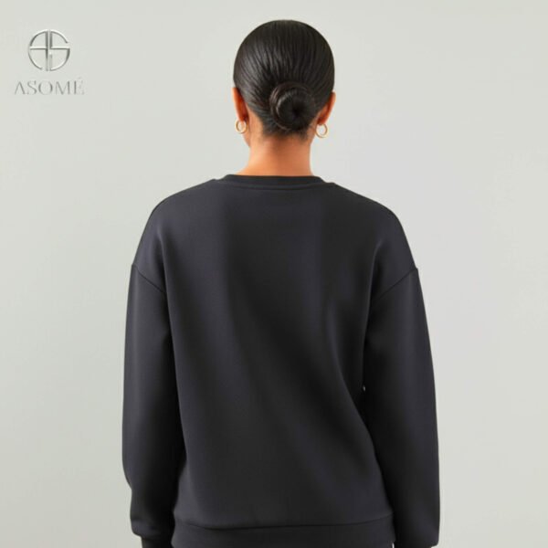 Front view of Asome black plain long hoodie with full sleeves and relaxed fit.